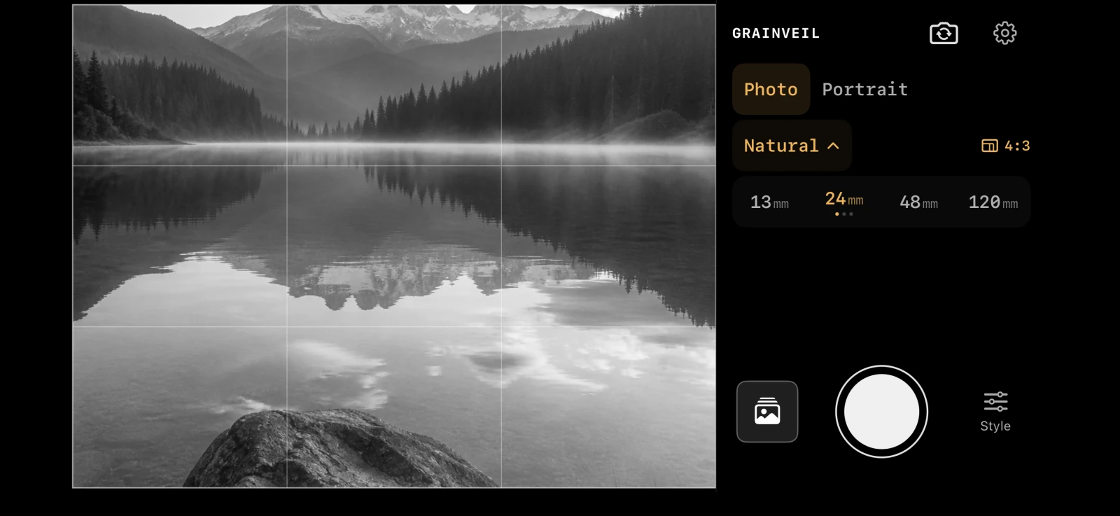 Grainveil 1.1’s landscape camera layout with a monochrome mountain lake and Natural lens controls
